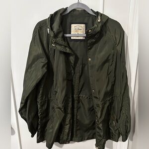 Dark green windbreaker